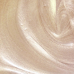 Texture fluide de l’Élixir Lumière 697 Doré