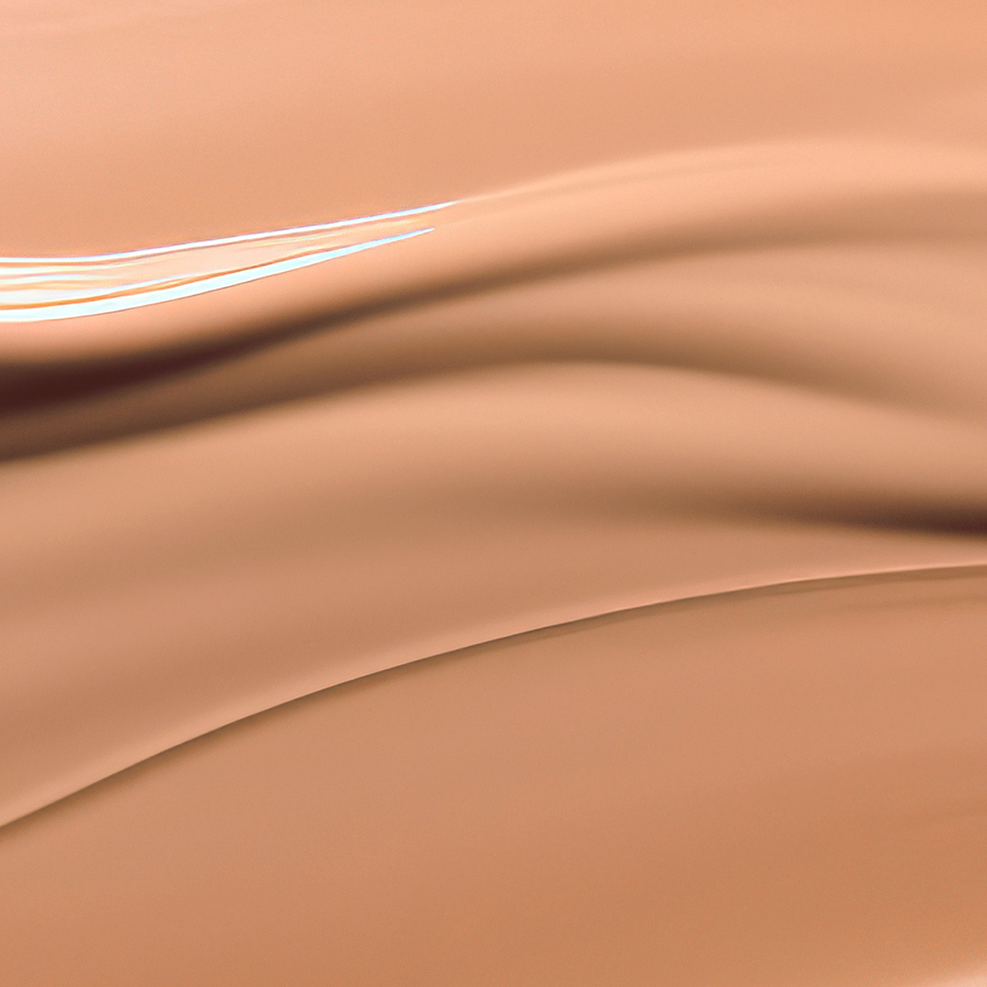 Texture fluide et légère du Sérum teinté seconde peau 874 Médium